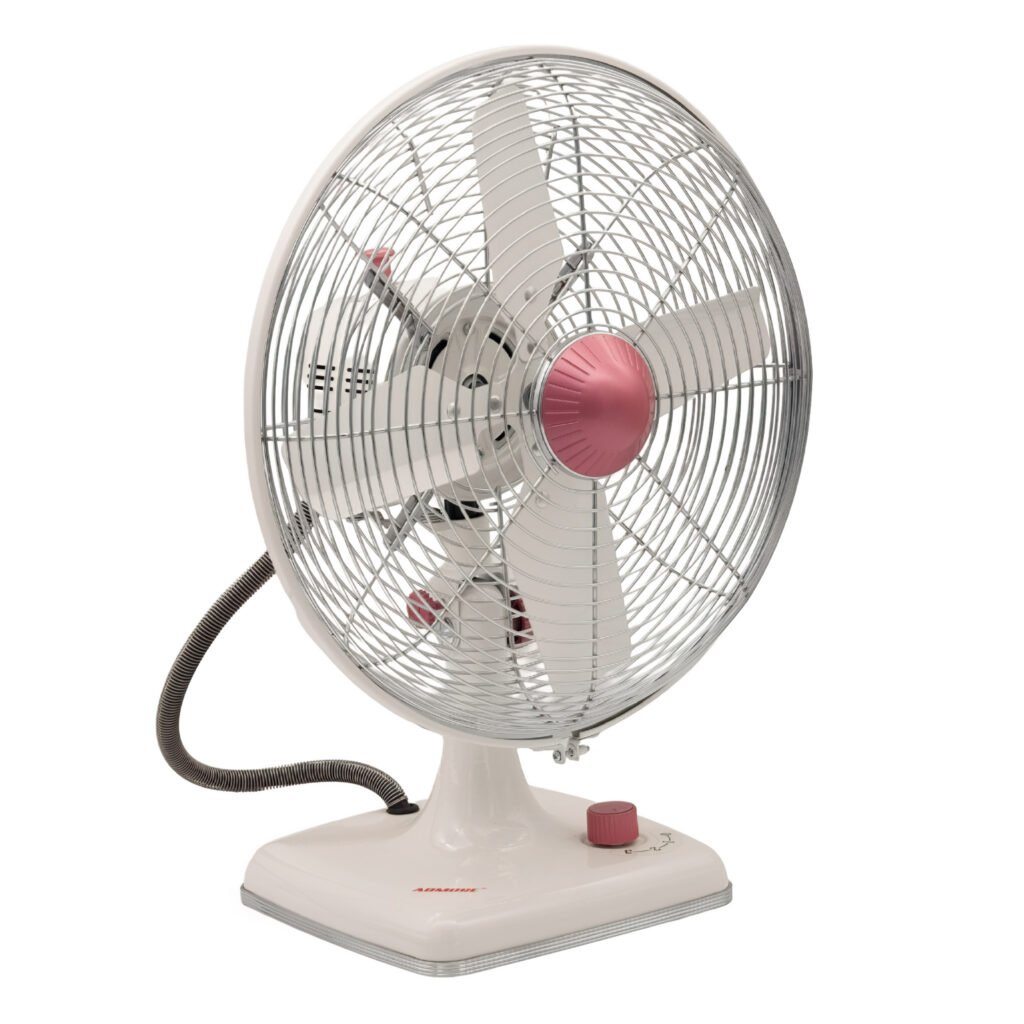 Admore A-TF30M 12-inch pearl white metal table fan with four white aluminum blades, chrome wire grill, pink central hub and pink rotary speed knob on a white square base, three-quarter view
