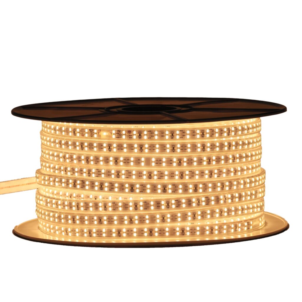 Powered-on Admore A-WLSL2-WW 50-meter warm white LED rope light reel showing two rows of warm yellow-white SMD LEDs in a clear IP65 sleeve on a black spool