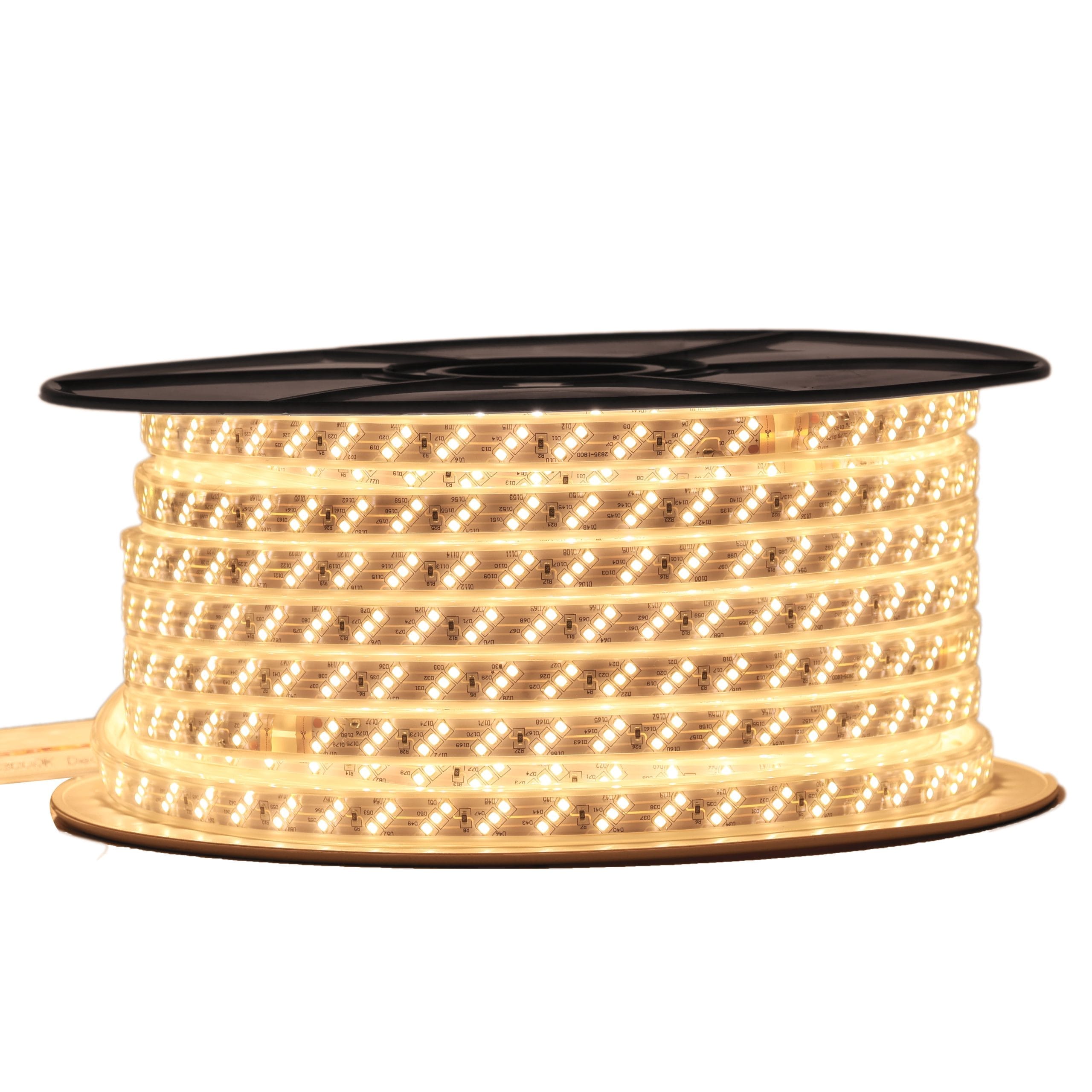 Powered-on Admore A-WLSL3-WW 50-meter warm white LED rope light reel showing three rows of warm yellow-white SMD LEDs in a clear IP65 sleeve on a black spool